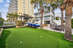 Outdoor dining - Aero Club: Luxury, Oceanfront Home with a Beautiful Pool Area (North Myrtle Beach)