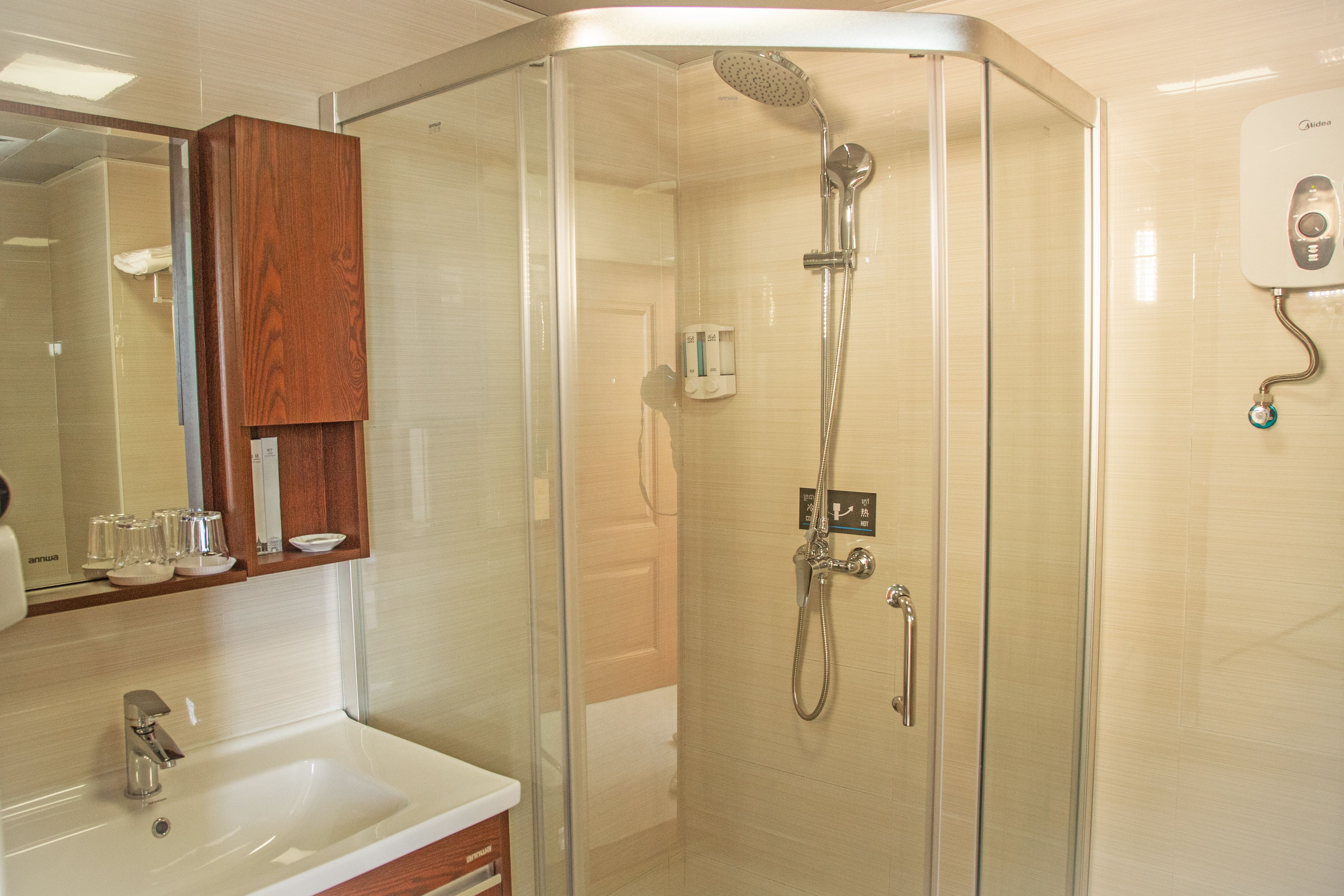 shower, free toiletries, hair dryer, slippers