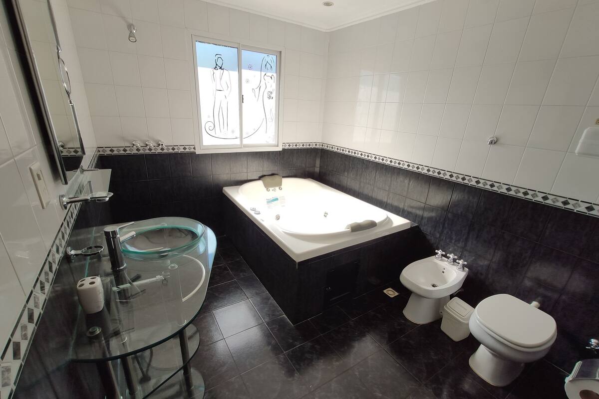 Deluxe Double Room | Bathroom | Bathtub, jetted tub, towels