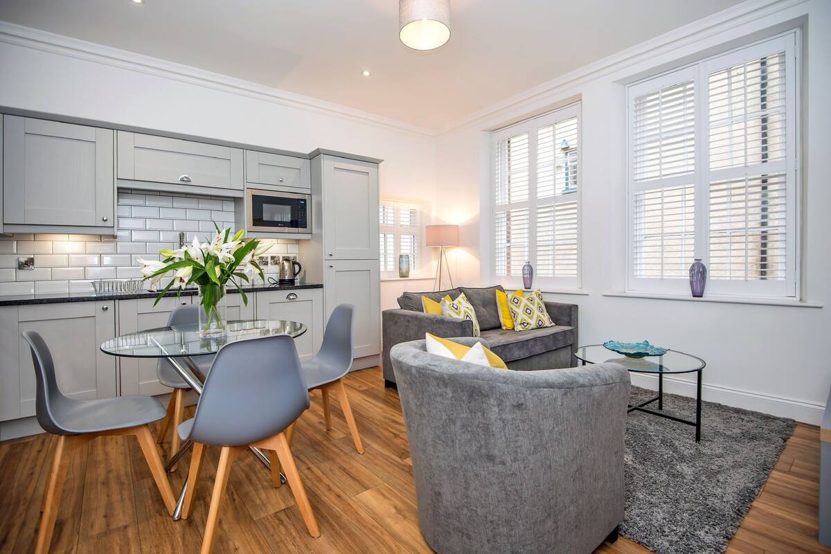Apartment, 2 Bedrooms (The Egerton) | Living area | Flat-screen TV