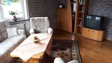 Comfort Condo, Ground Floor (Ebbe - incl. cleaning Fee 60 EUR) | Living area | Flat-screen TV