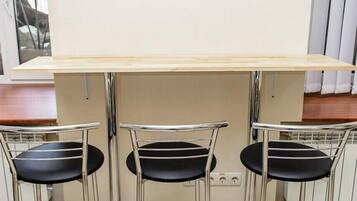 Full-size fridge, microwave, cookware/dishes/utensils