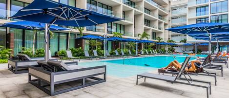 Outdoor pool, pool umbrellas, sun loungers