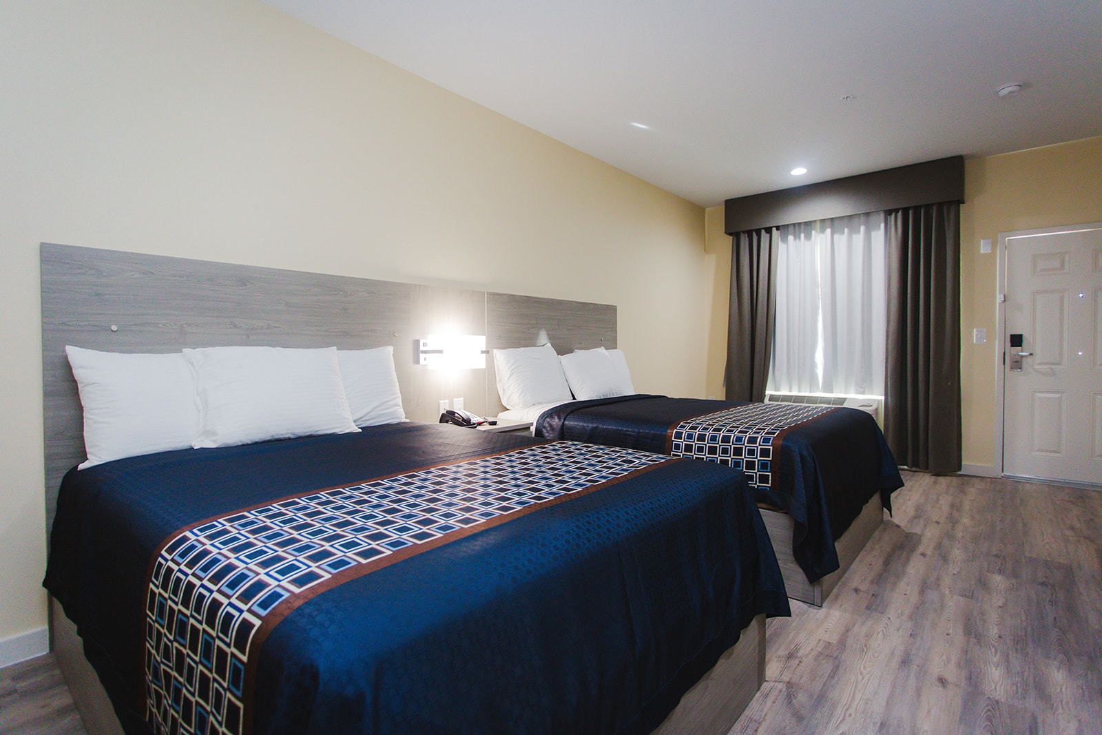 Standard Room, 2 Queen Beds, Non Smoking | Desk, blackout drapes, soundproofing, iron/ironing board