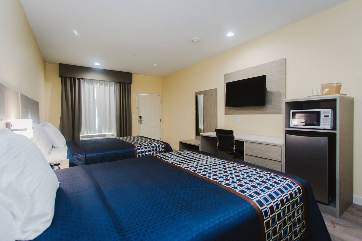 Standard Room, 2 Queen Beds, Non Smoking | Desk, blackout drapes, soundproofing, iron/ironing board