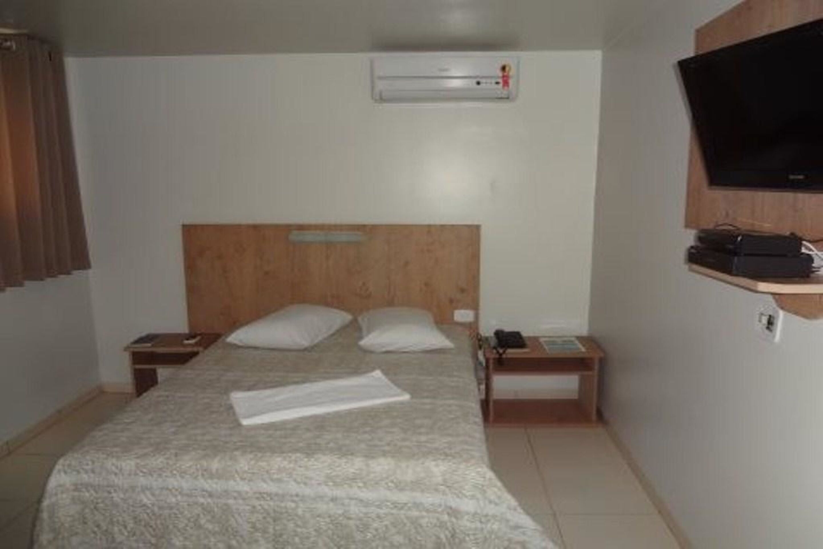 Double Room | Minibar, desk, iron/ironing board, free WiFi