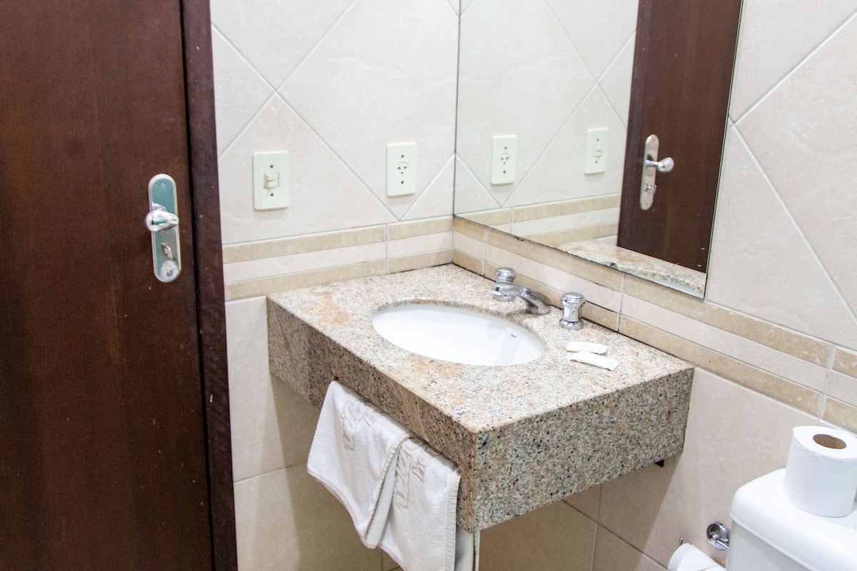 shower, towels, soap, toilet paper