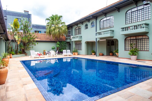 Indoor pool, outdoor pool, open 9:00 AM to 9:00 PM, pool loungers