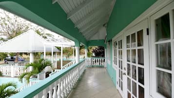 Deluxe Room, Private Bathroom, Garden View | Balcony