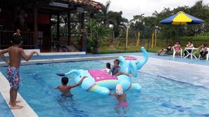 Outdoor pool, pool umbrellas, pool loungers