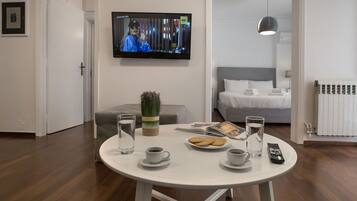 Apartment, 1 Bedroom | Living area | TV