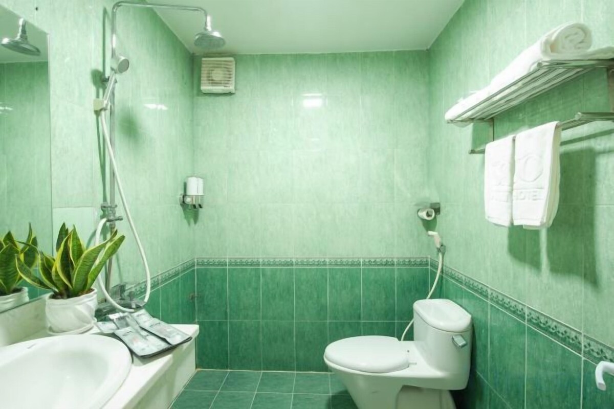 Bathroom | Shower, rainfall showerhead, designer toiletries, hair dryer