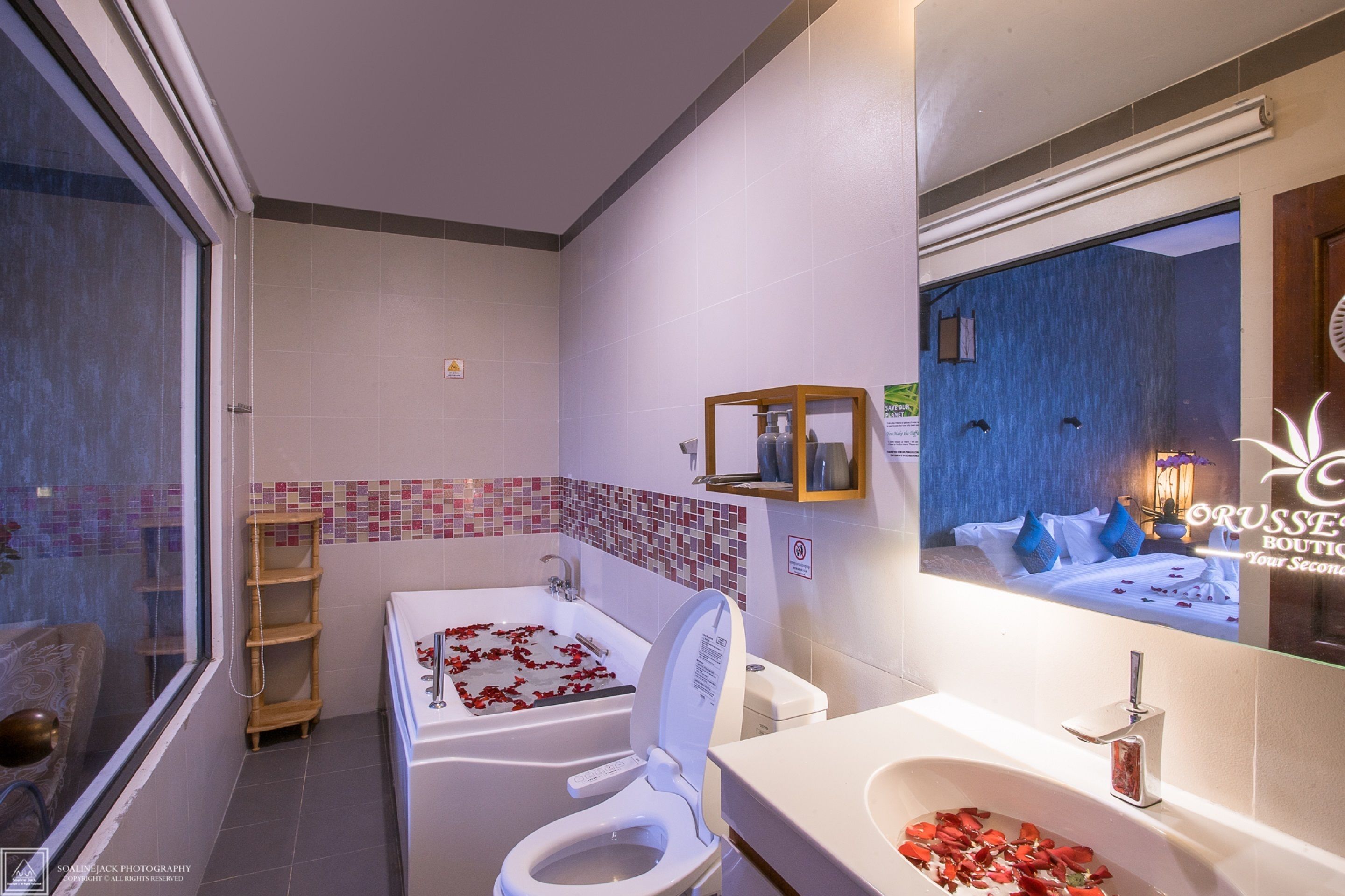 combined shower/bathtub, deep-soaking bathtub, designer toiletries