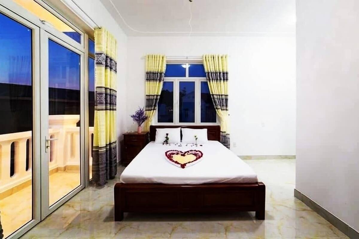 Desk, laptop workspace, blackout curtains, iron/ironing board