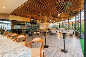 Breakfast, lunch, dinner served; local and international cuisine