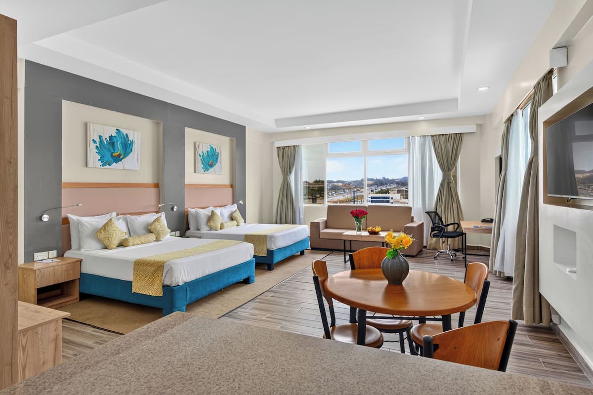 Ropa de cama de alta calidad y minibar 