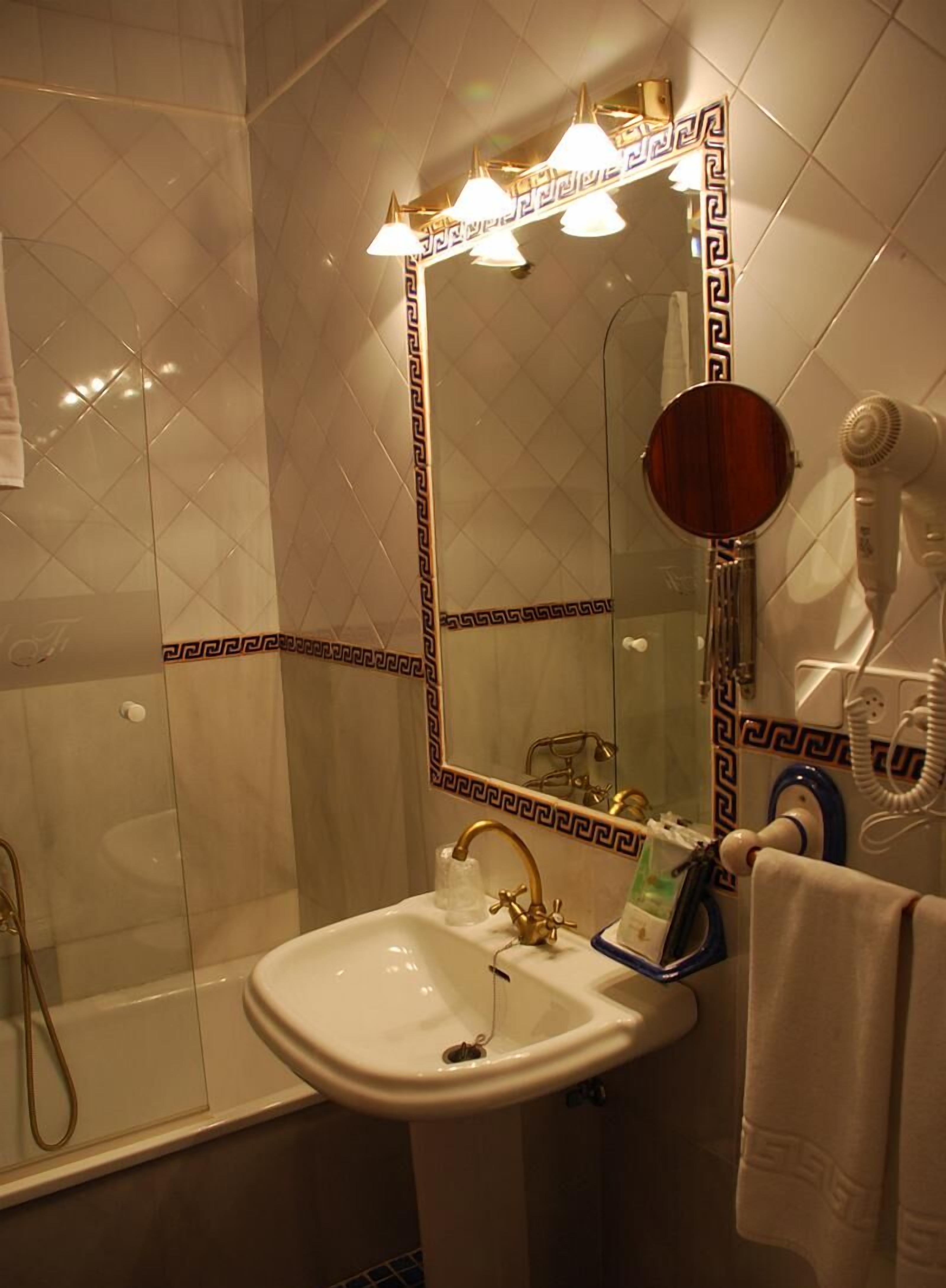 hair dryer, bathrobes, slippers, towels