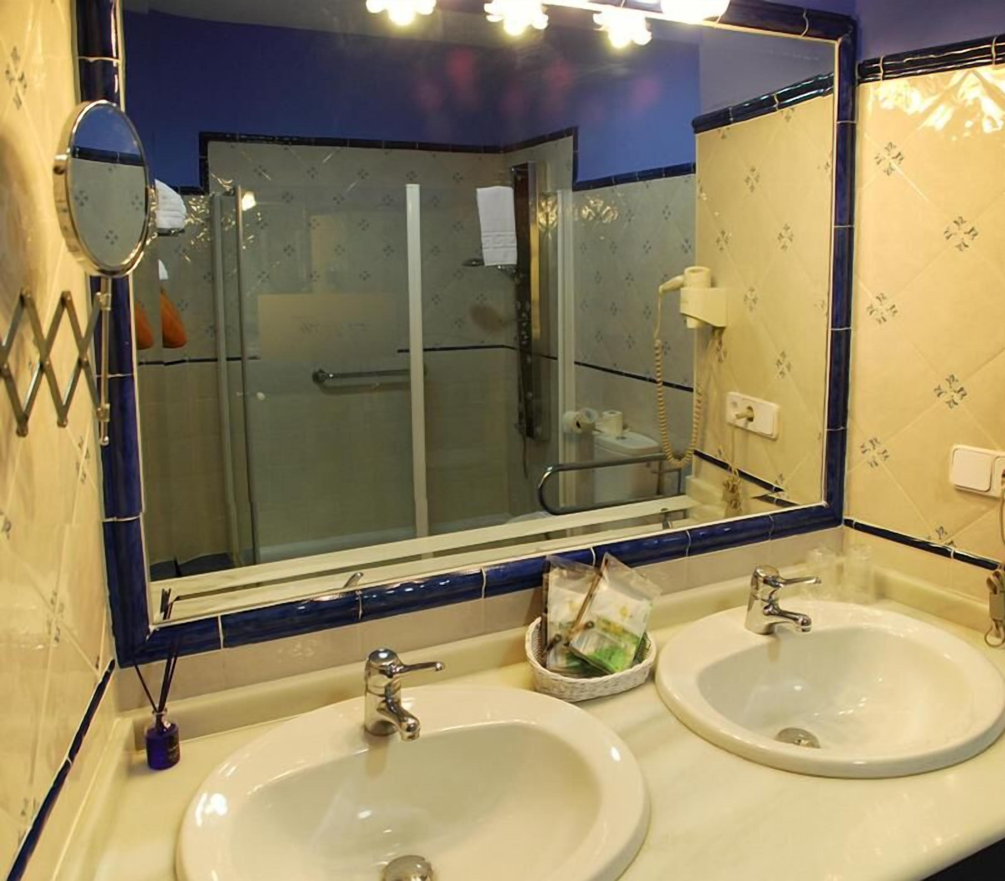 superior twin room | bathroom | hair dryer, bathrobes, slippers, towels