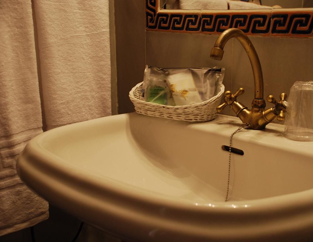 single room | bathroom | hair dryer, bathrobes, slippers, towels