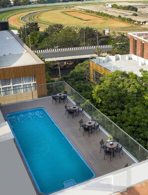Indoor pool, open 6:00 AM to 6:30 PM, sun loungers - Zion A Luxurious Hotel Bangalore (Bengaluru)