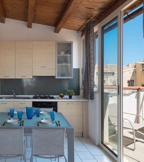 Apartment, 2 Bedrooms, Terrace | Private kitchen | Full-sized fridge, oven, stovetop, dishwasher - Aretusa Apartments by Wonderful Italy (Syracuse)