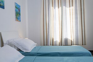 Apartamento, 2 quartos | 2 quartos, berços (sobretaxa), Wi-Fi de cortesia, roupa de cama