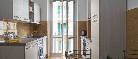 Apartment, 2 Bedrooms | Private kitchen | Full-size fridge, oven, stovetop, electric kettle