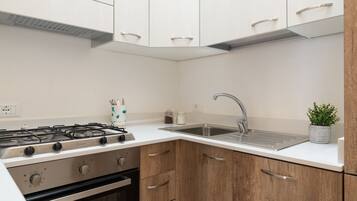 Villa, 3 Bedrooms | Private kitchenette | Full-size fridge, oven, stovetop, dishwasher