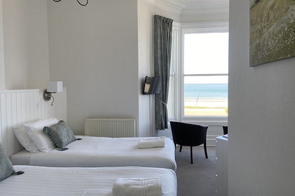 Comfort Double or Twin Room, Sea View | Individually furnished, iron/ironing board, bed sheets