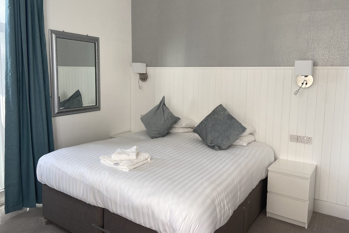 Individually furnished, iron/ironing board, bed sheets