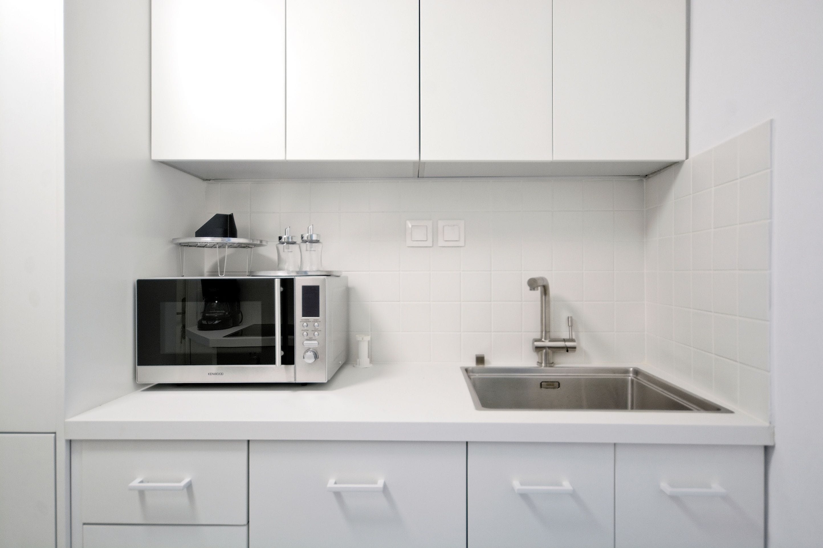 Deluxe Apartment, 4 Bedrooms, Private Bathroom, Ground Floor | Private kitchen | Full-size fridge, microwave, oven, stovetop