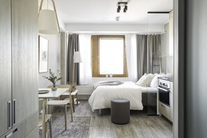Desk, blackout curtains, soundproofing, iron/ironing board