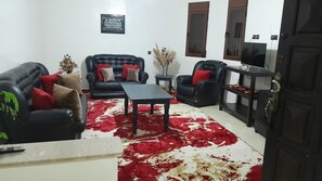 Family Villa, 2 Bedrooms, Garden View | Living area | TV, video-game console - Welcome Home (Beni Mellal)