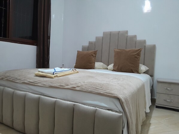 Family Villa, 2 Bedrooms, Garden View | In-room safe, iron/ironing board, WiFi (free), individually decorated - Welcome Home (Beni Mellal)