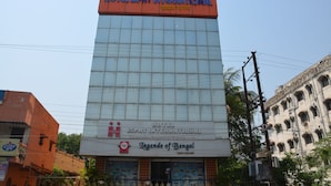 A hotel named Hotel Ispat International with a signboard indicating it is a 5-star hotel. - Hotel Ispat International (Asansol)