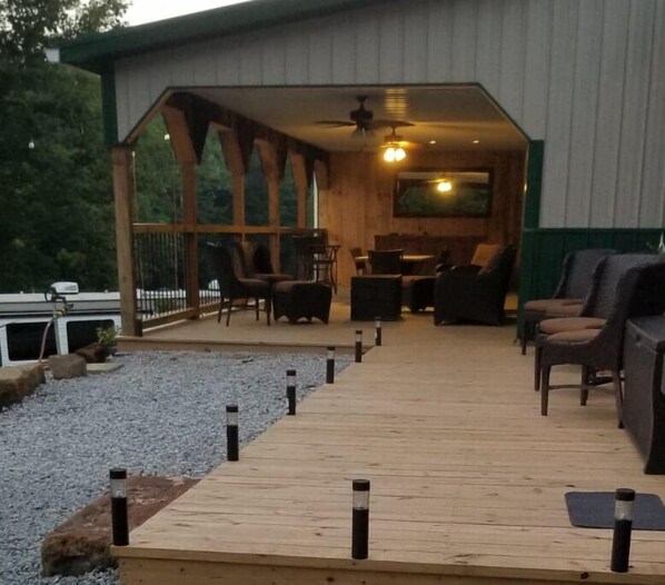 Relax on the deck with comfortable seating areas and a peaceful atmosphere.