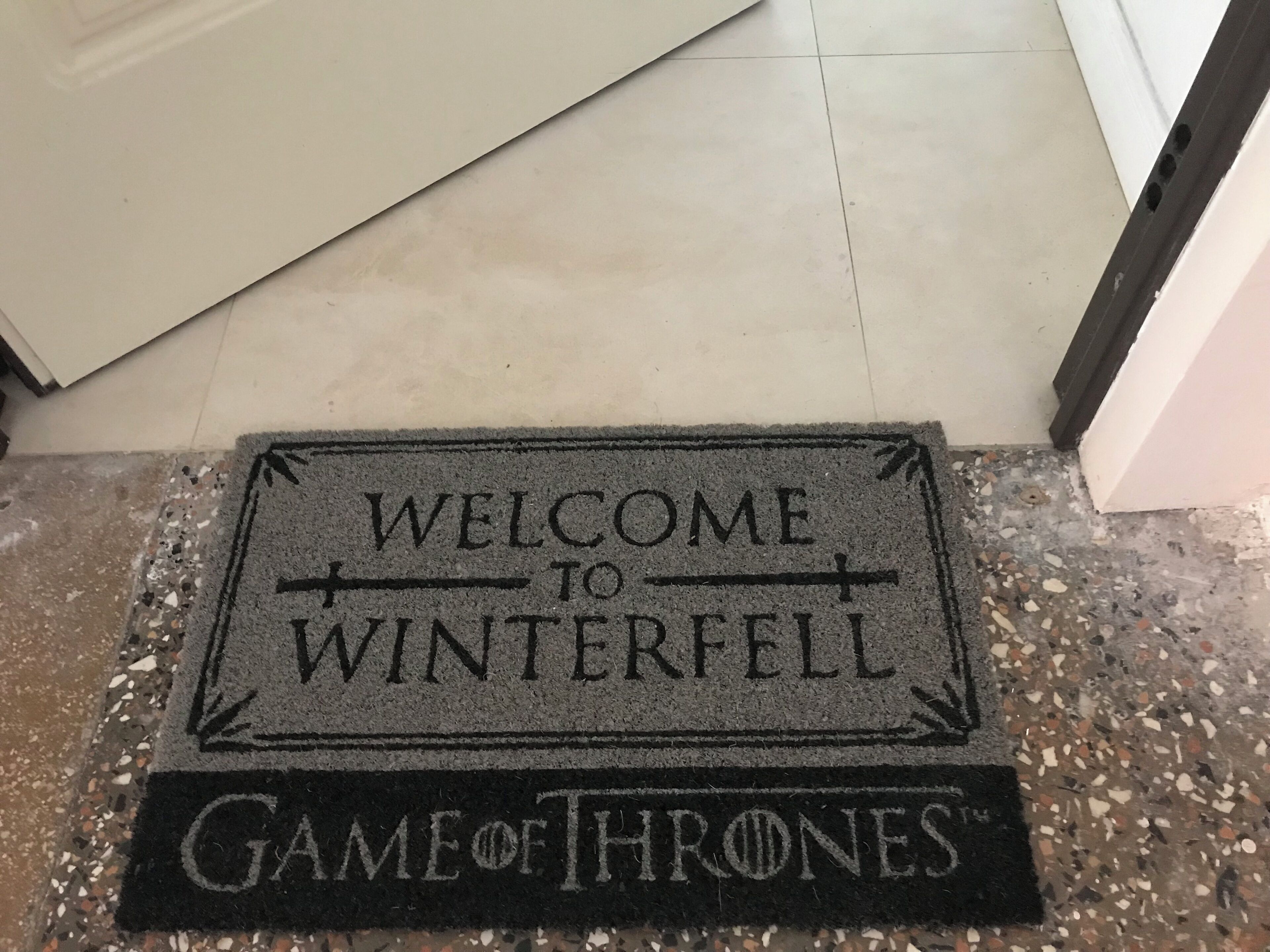 A welcome mat with the text "WELCOME TO WINTERFELL GAME OF THRONES".
