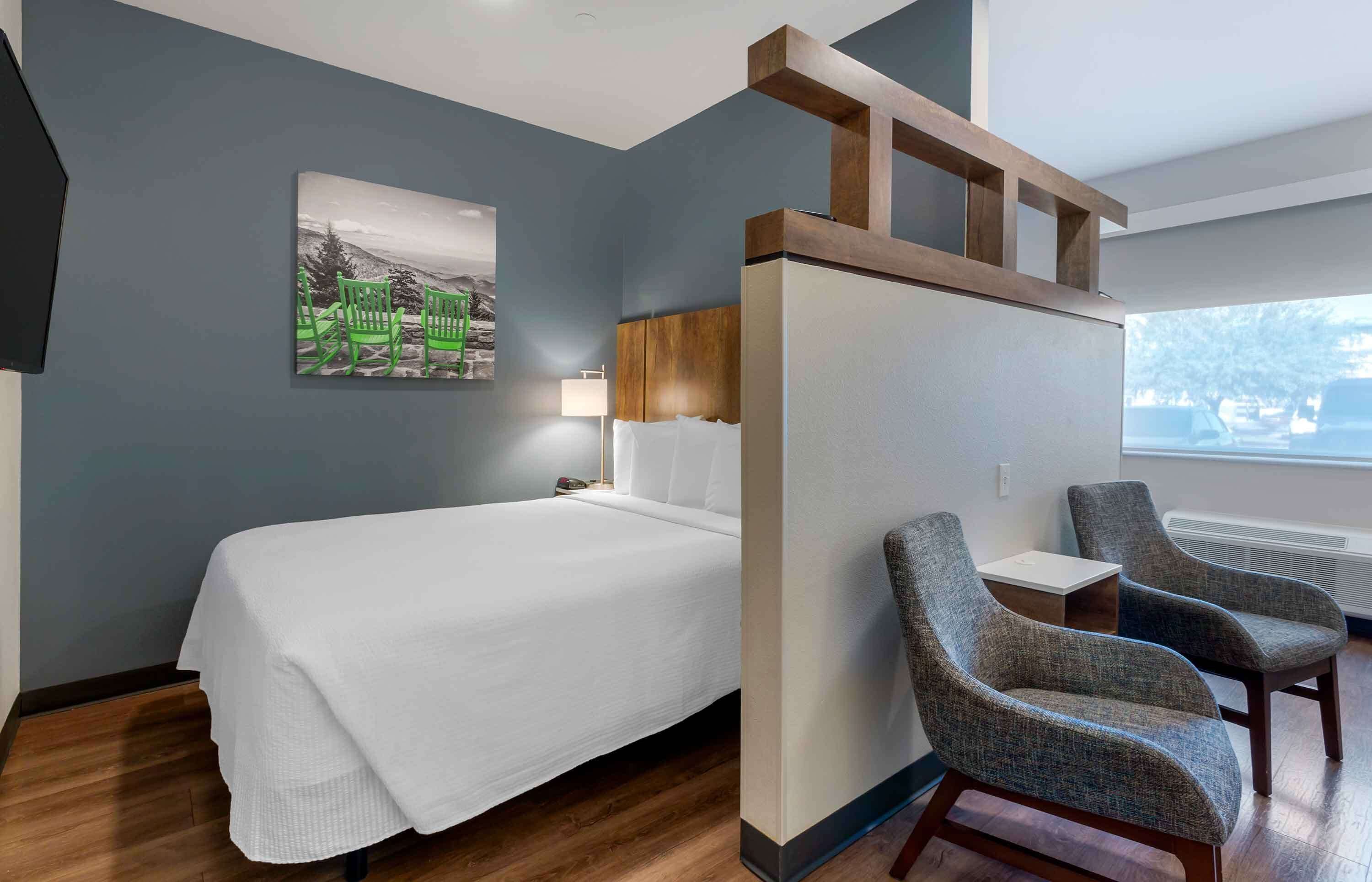 premium bedding, desk, laptop workspace, iron/ironing board