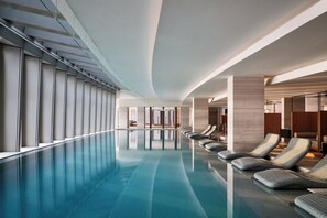 Indoor pool, pool loungers, lifeguards on site