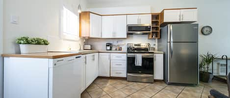 Apartment, Balcony | Private kitchen | Fridge, microwave, espresso maker, coffee/tea maker