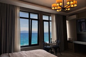 Premium bedding, down comforters, memory foam beds, free minibar