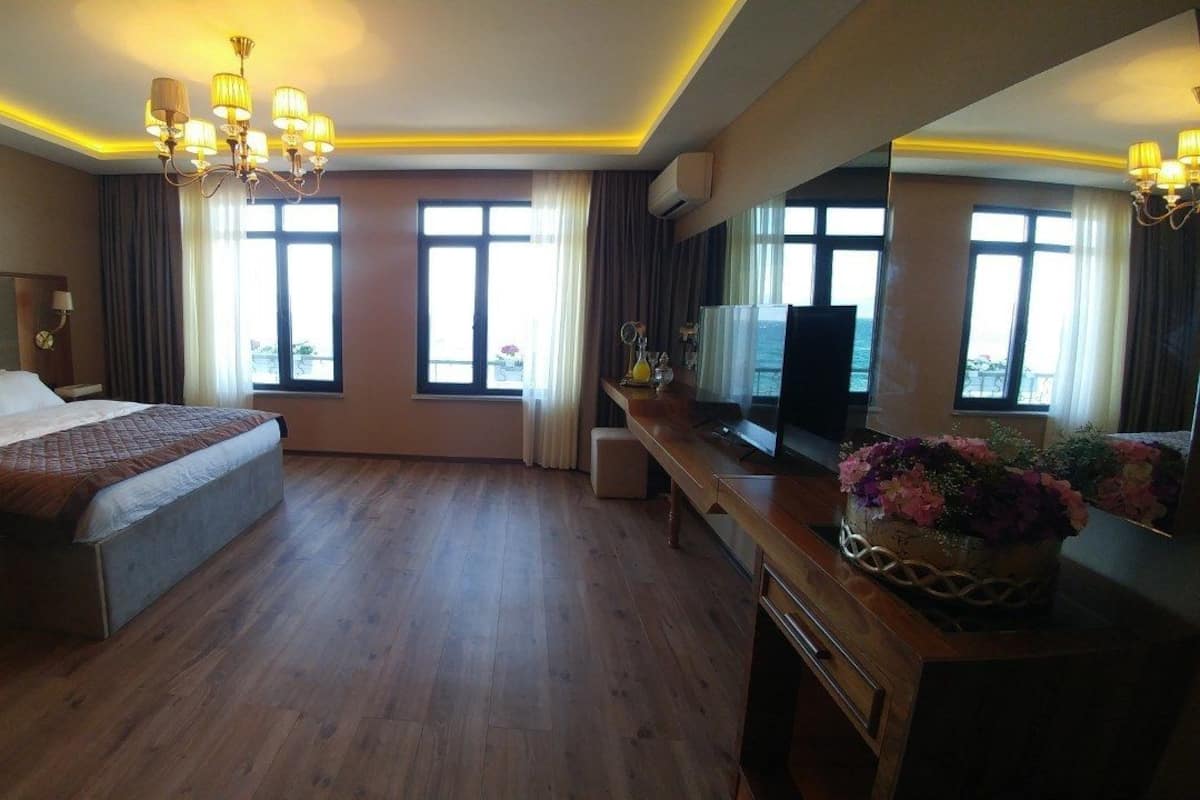 Deluxe Room, Sea View | Premium bedding, down duvets, memory-foam beds, free minibar