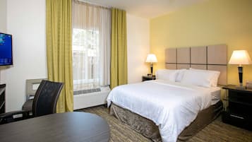 Down duvets, desk, laptop workspace, blackout curtains