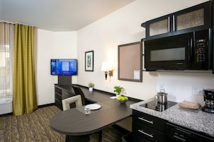 Studio Suite, 1 Queen Bed | Private kitchen | Full-size fridge, microwave, stovetop, dishwasher