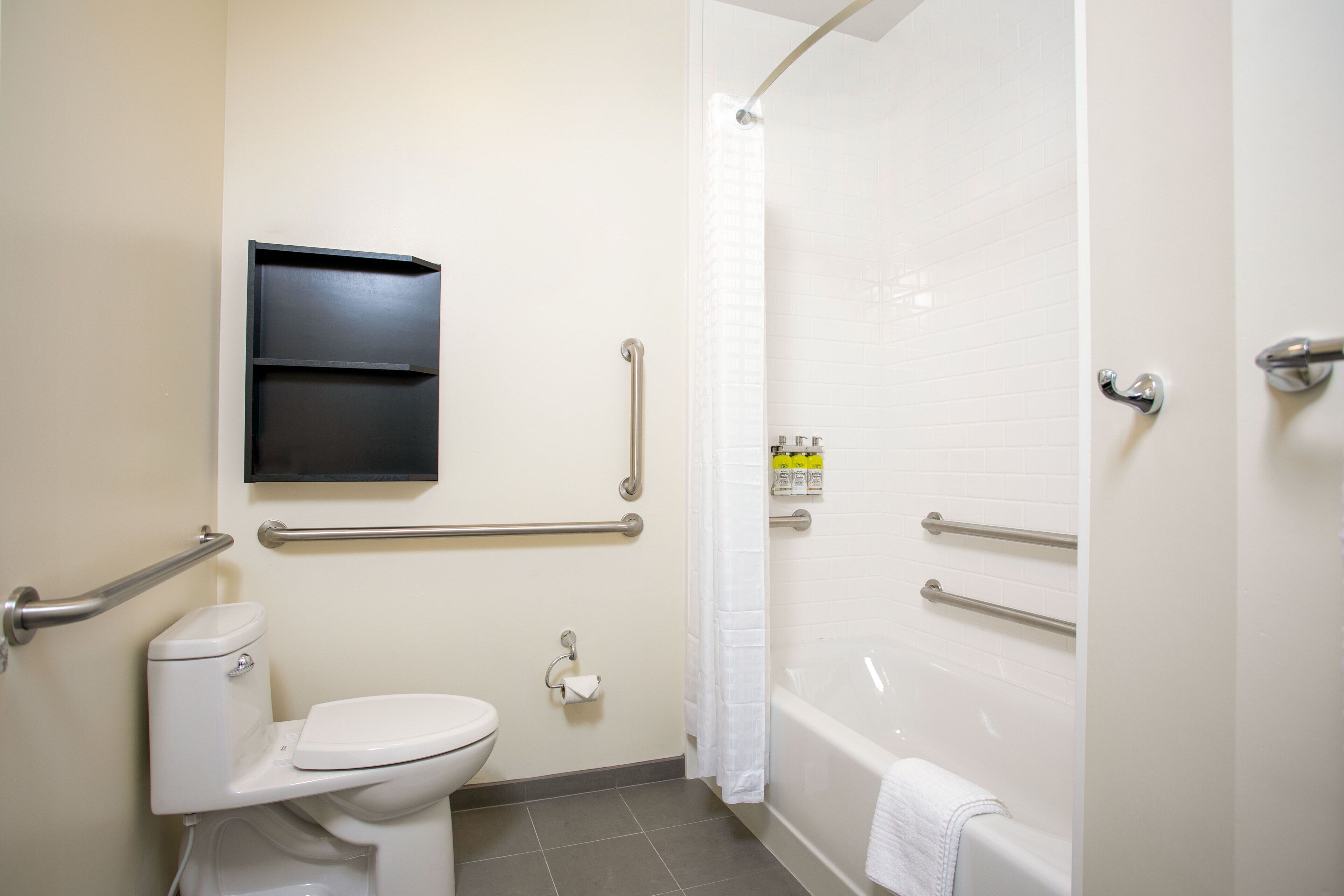 studio suite, 1 queen bed, accessible (accessible tub) | bathroom | combined shower/bathtub, hair dryer, towels