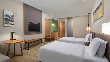 Bộ đồ giường cao cấp, minibar, két bảo mật tại phòng