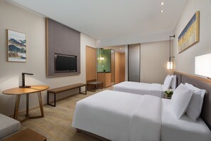 Bộ đồ giường cao cấp, minibar, két bảo mật tại phòng 