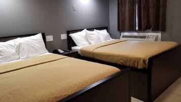 Standard Room, 2 Queen Beds | Desk, free WiFi, bed sheets