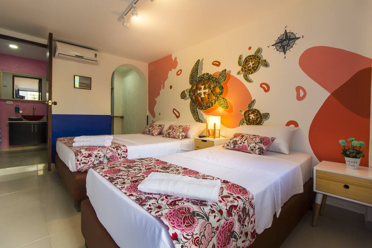Habitación triple Confort | Wifi gratis y ropa de cama