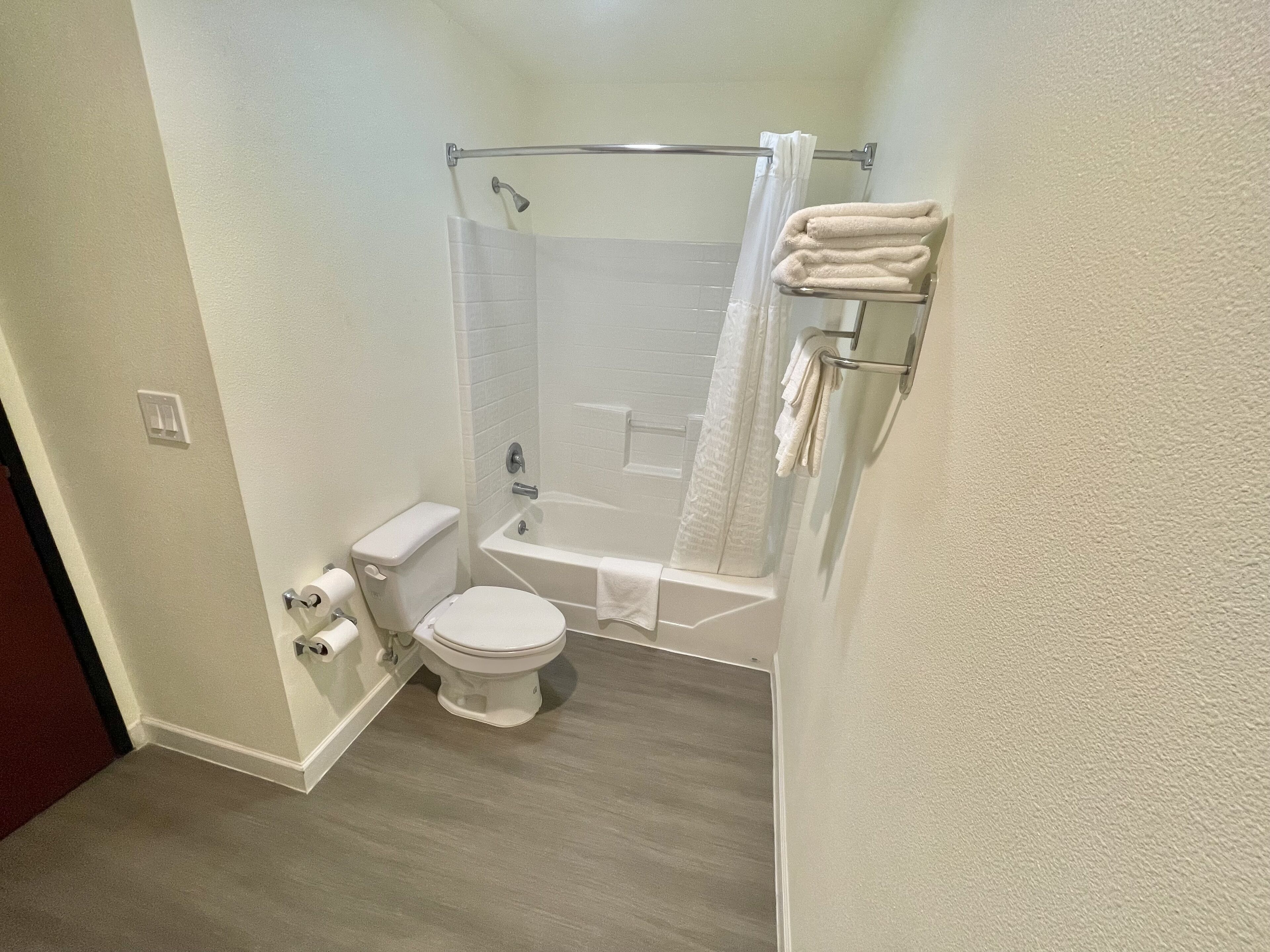 signature room, 1 king bed, non smoking, kitchenette | bathroom | hair dryer, bathrobes, towels, soap